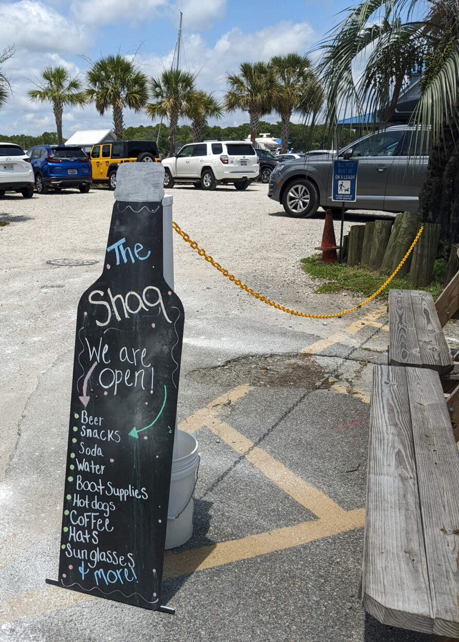 the shap open sign at Wacca Wache Marina